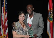 Larry Hart receiving the Legacy Award